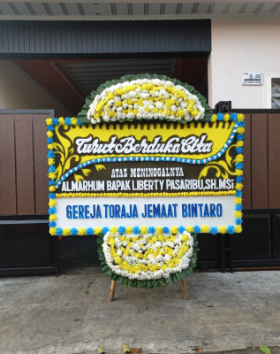 Papan Bunga Duka di Diloato